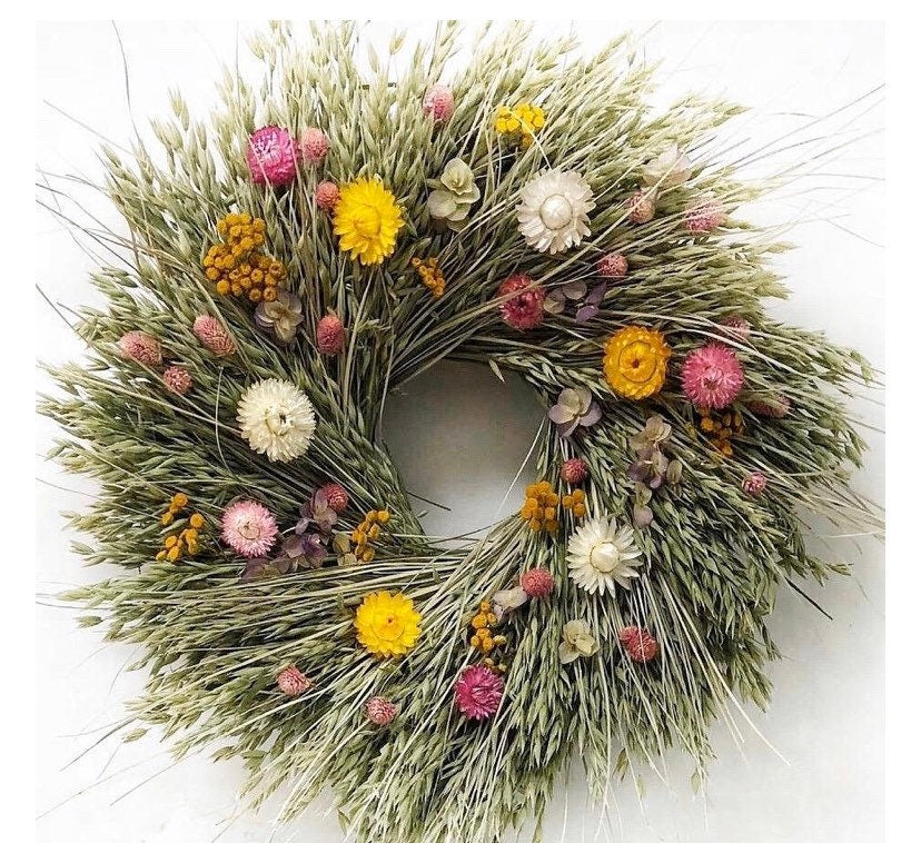 Garden Party dried flower wreath with pink, yellow, and white dried flowers from The Gathering Garden